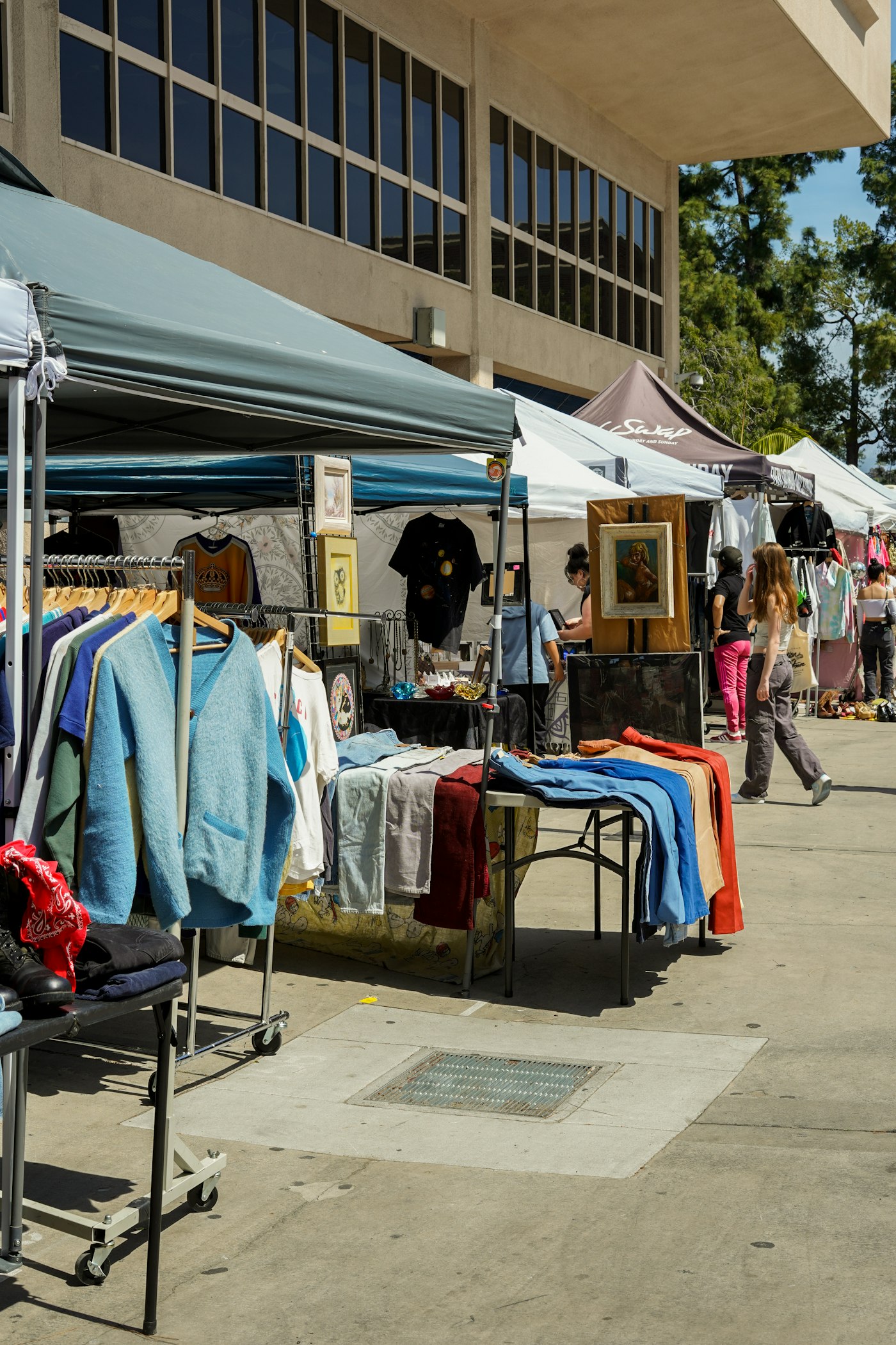 Group of people shopping at a flea market