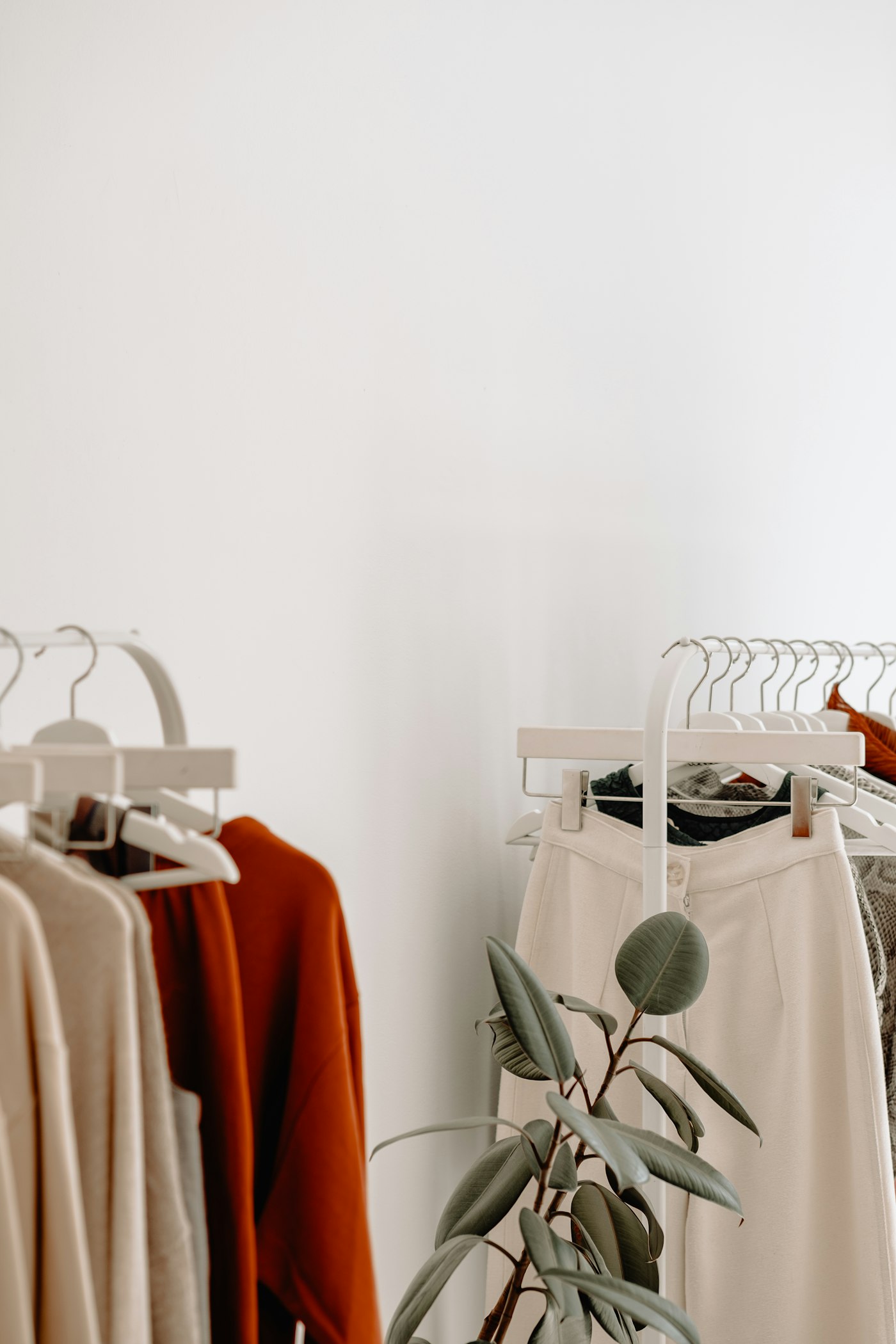 Neutral-toned clothing racks
